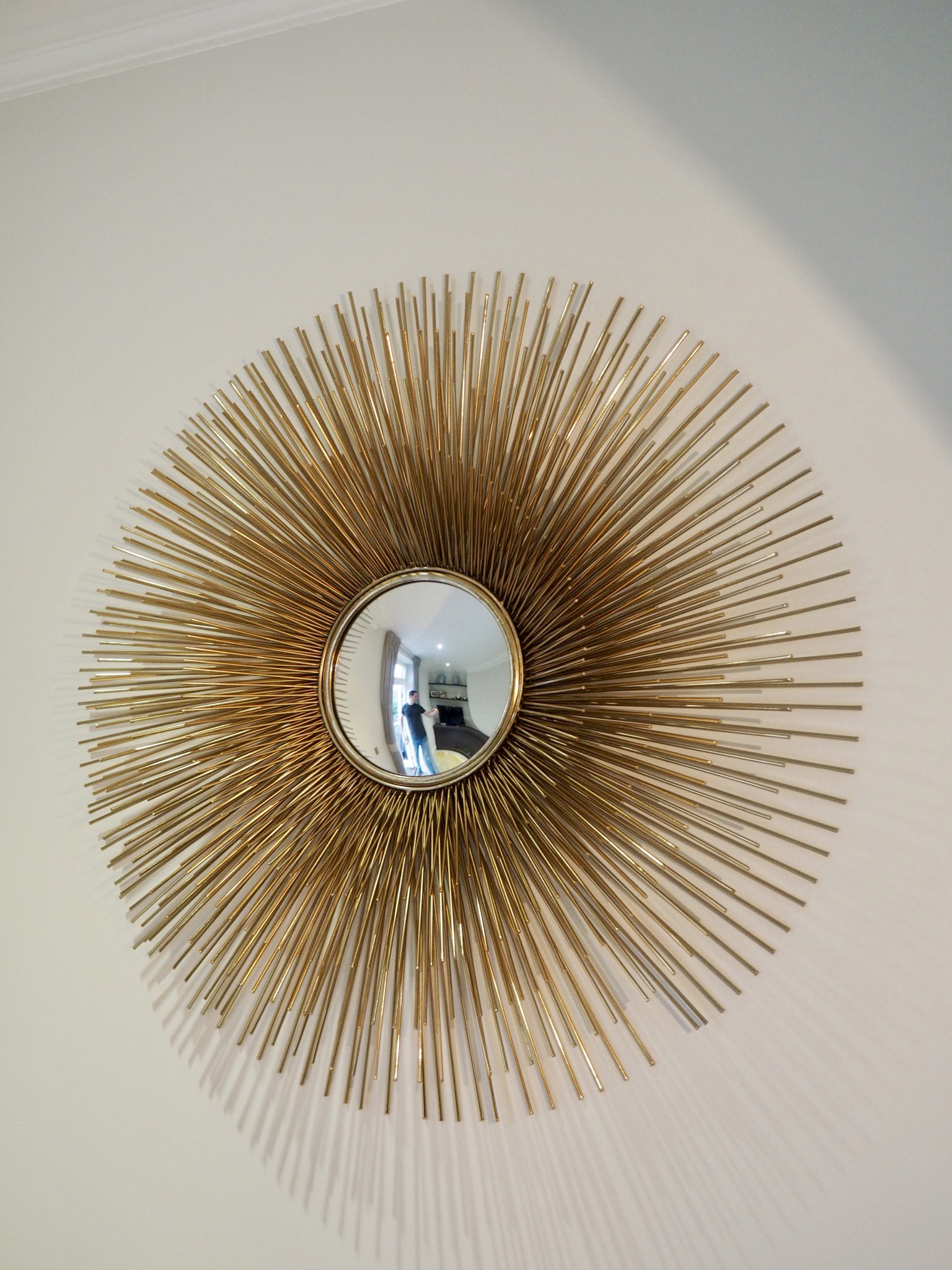 Gold Porcupine Mirror with three levels of prongs